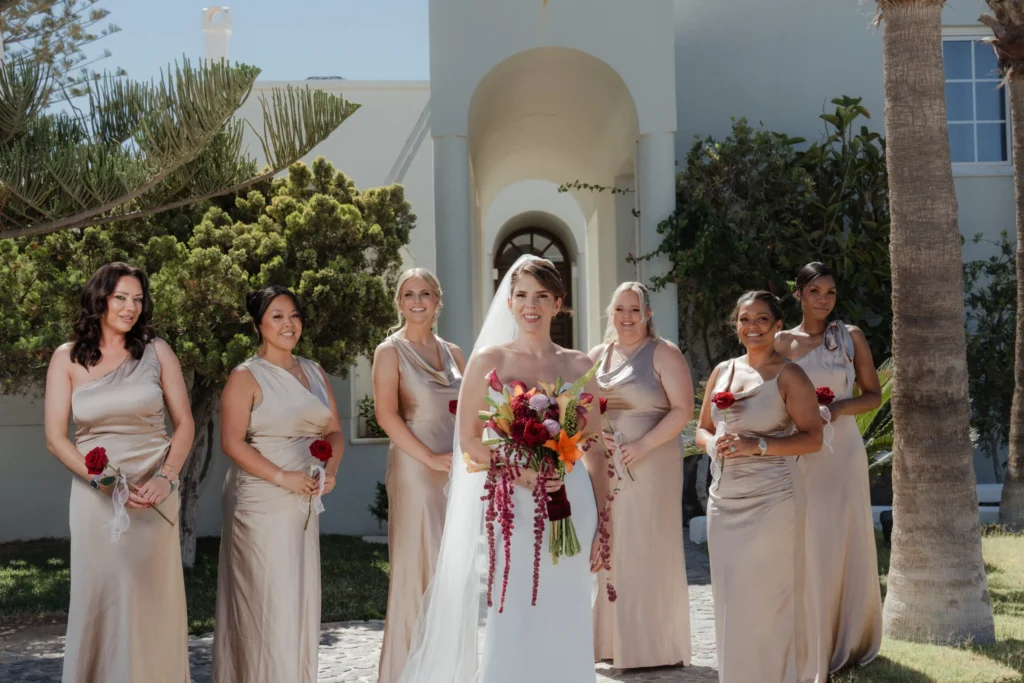 Kerry & Ayden wedding at Santorini Gem — the bride walking in with her bridesmaids