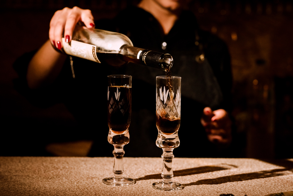 Santorini wine poured at a tasting in Pyrgos