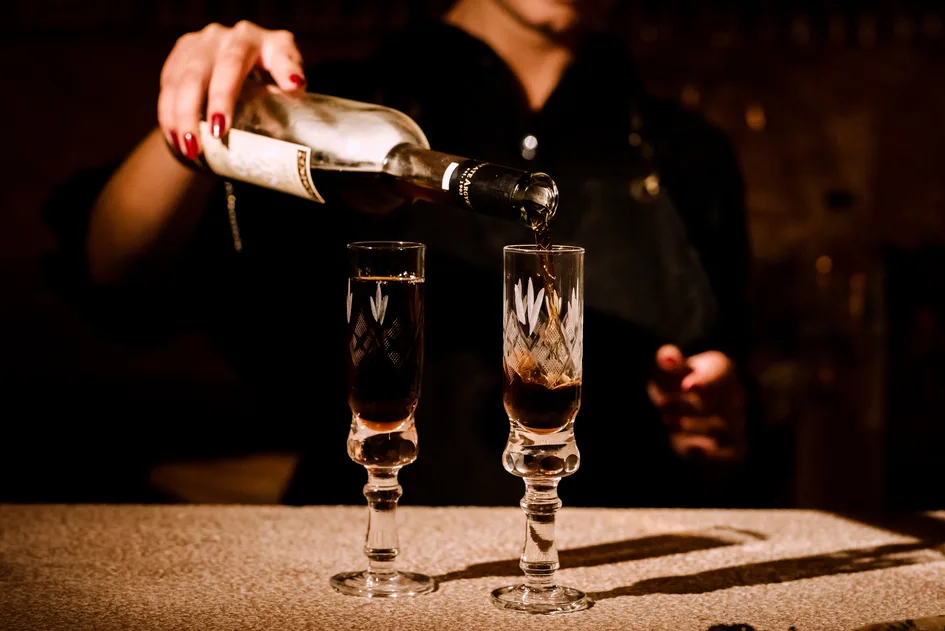 Santorini wine poured at a tasting in Pyrgos