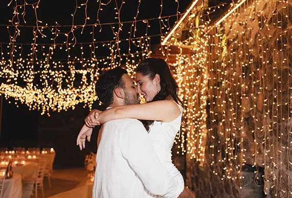 Fairy lights above a wedding reception in Santorini