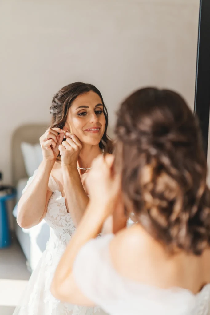 Elisa & Diego wedding at Astra Chapel & 5 Senses Restaurant, Santorini — the final touches before the ceremony