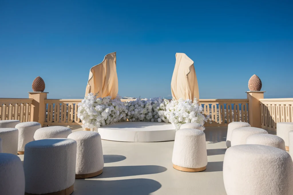 Kirsty & Julian wedding at Madame Sousou, Santorini — the ceremony set out on the terrace