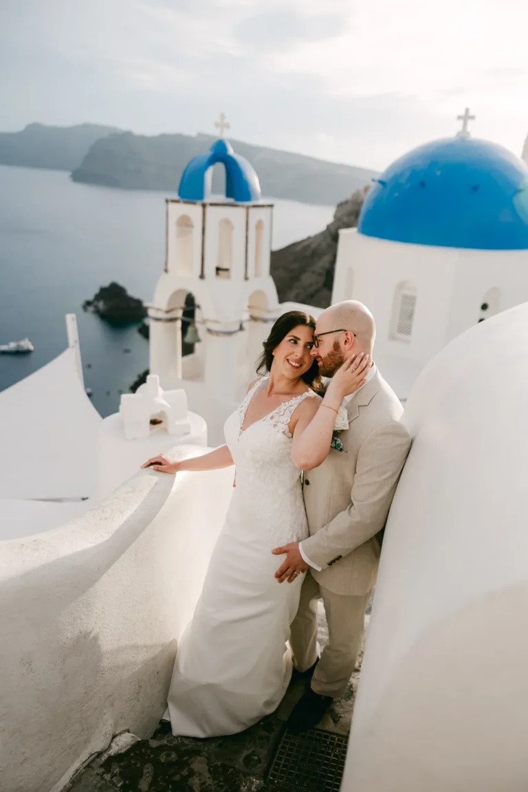 Loren & Matt wedding at Love Cave Venue, Santorini — together above the blue domes of Oia